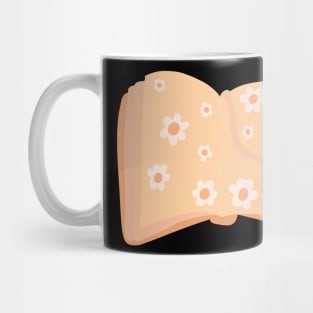 Open, orange book with daisy flowers for readers Mug